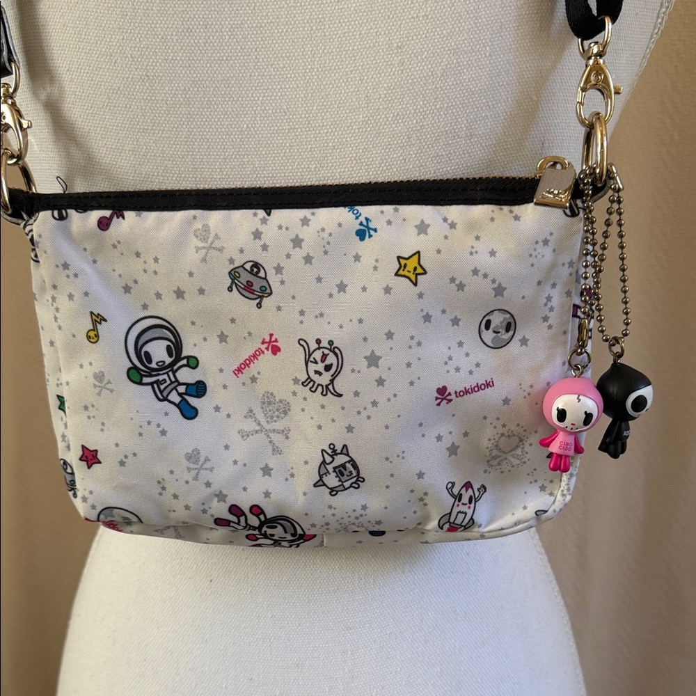 Le Sport Sac Tokidoki Vintage White Crossbody Bag with Space theme.